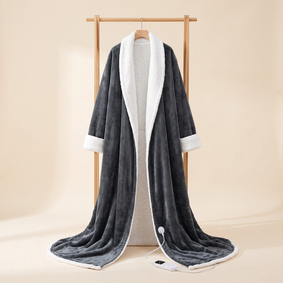 Morrow Heated Robe with white sherpa collar, hung on a stand